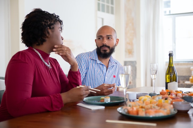 A couple eating together